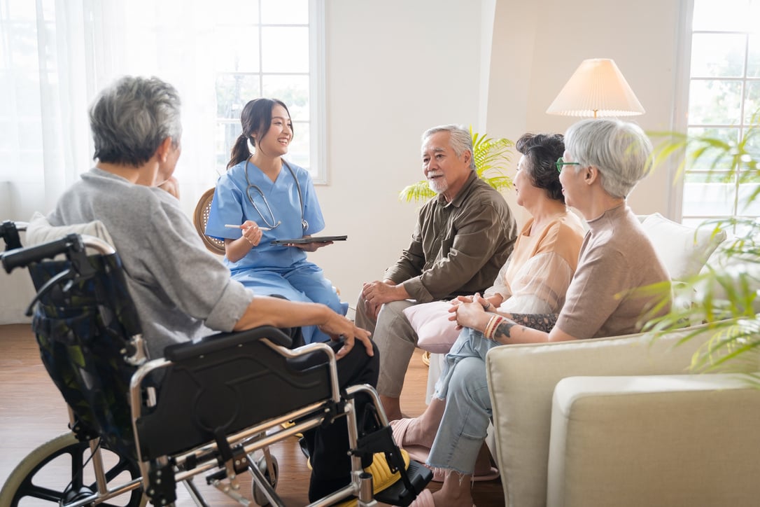 Group of Elderly Getting Checked by Nurse 