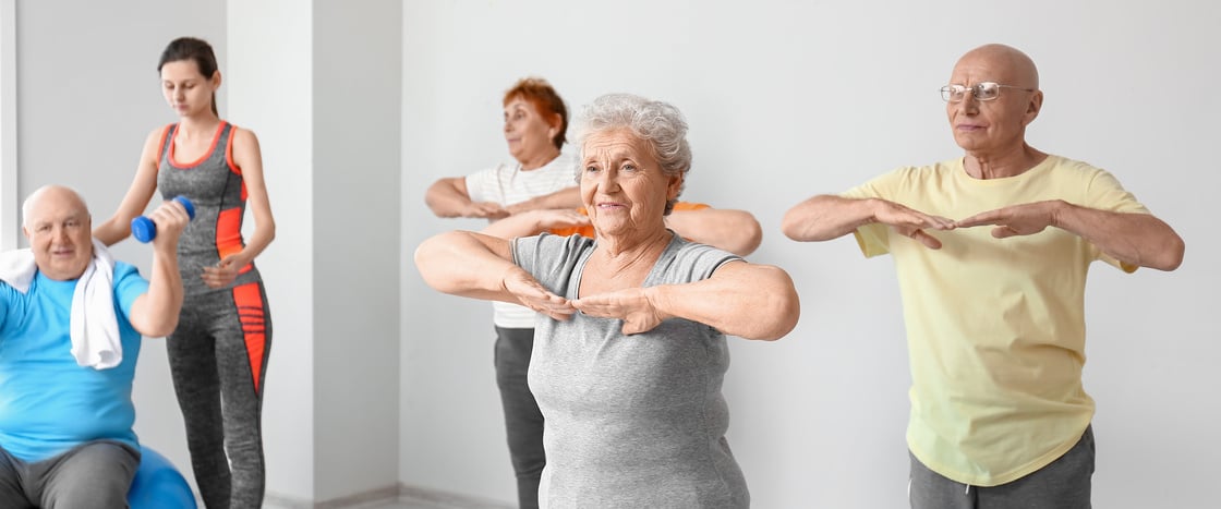 Elderly People Exercising in Gym